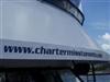 Sloping side of charter yacht Miss Toronto